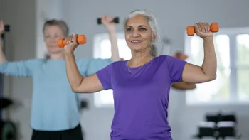 Movement exercise: woman working out with weights 2187783059