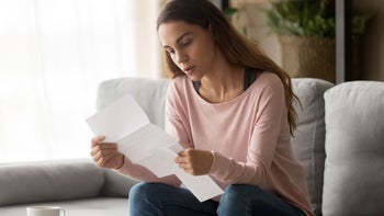 FSA HSA: woman reading document 1173666087