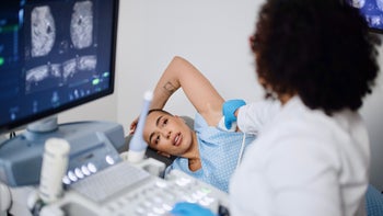 Medicare: woman at breast ultrasound 1394005449(2)