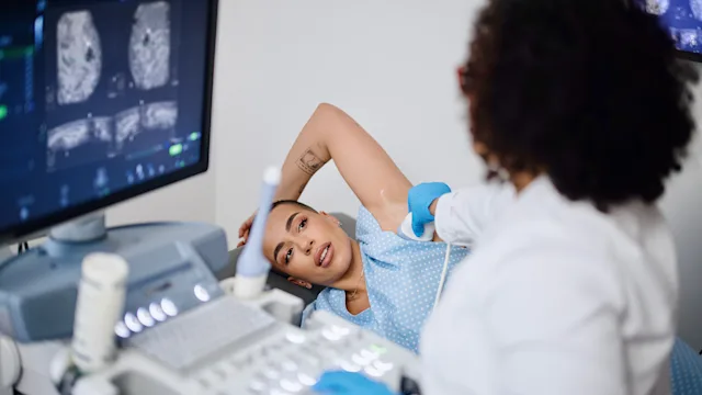 Medicare: woman at breast ultrasound 1394005449(2)