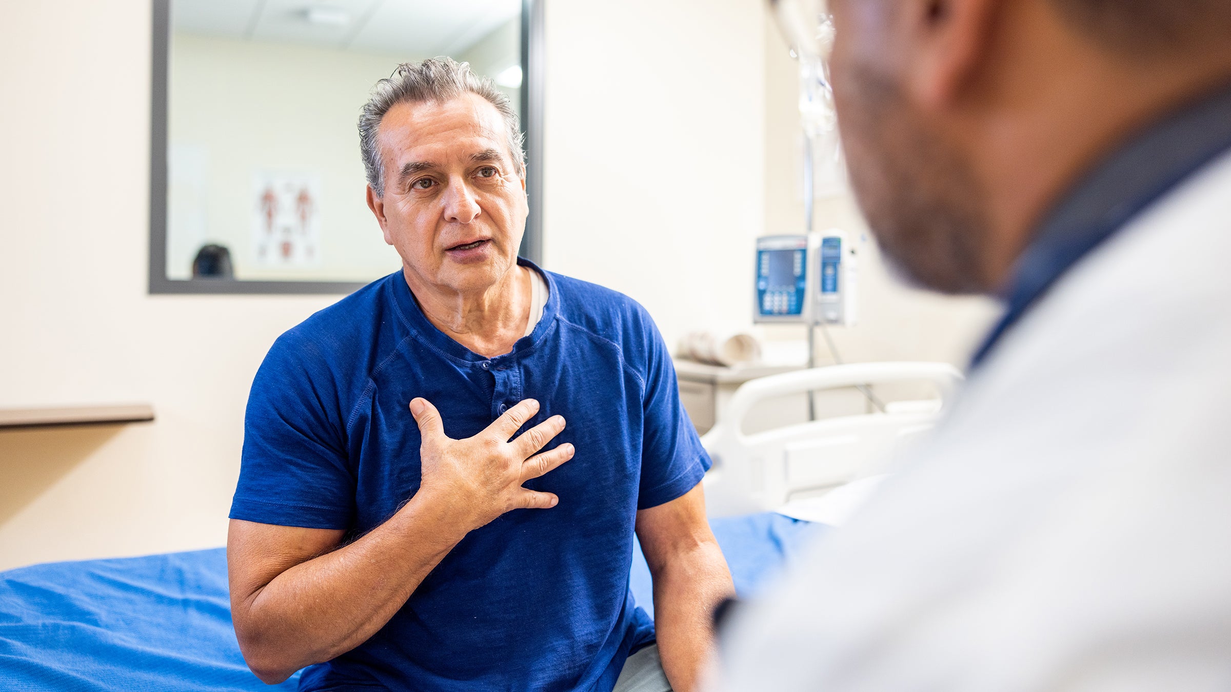 mens health: senior man at doctor appointment 1511586817