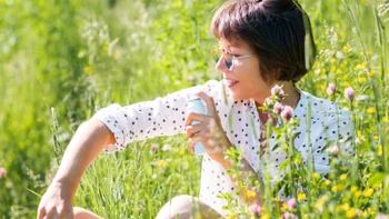 Environmental: spraying bug repellent 1346068933