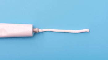white tube and white cream blue background 1276766365