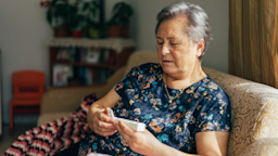Senior woman holding a daily pill organizer
hsyncoban/E+via Getty Images 