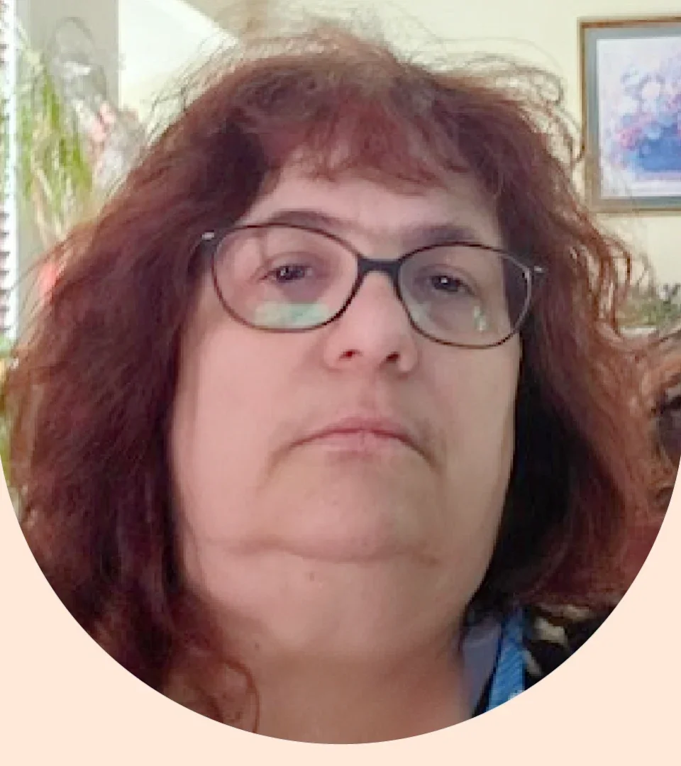 Jackie Muske is pictured in a headshot.