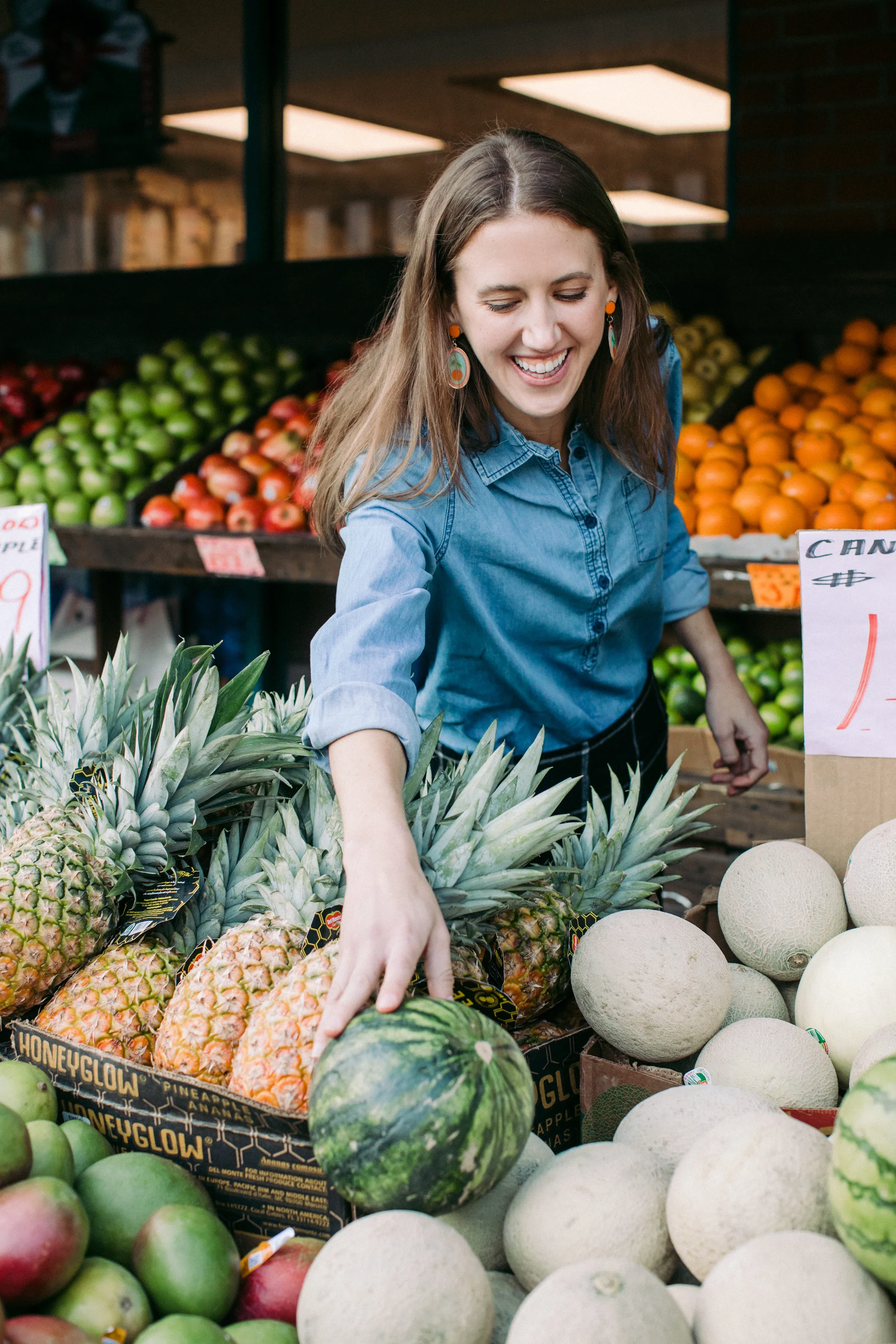 Jacqueline Alnes is pictured shopping for vegetables at a farmers’ market.