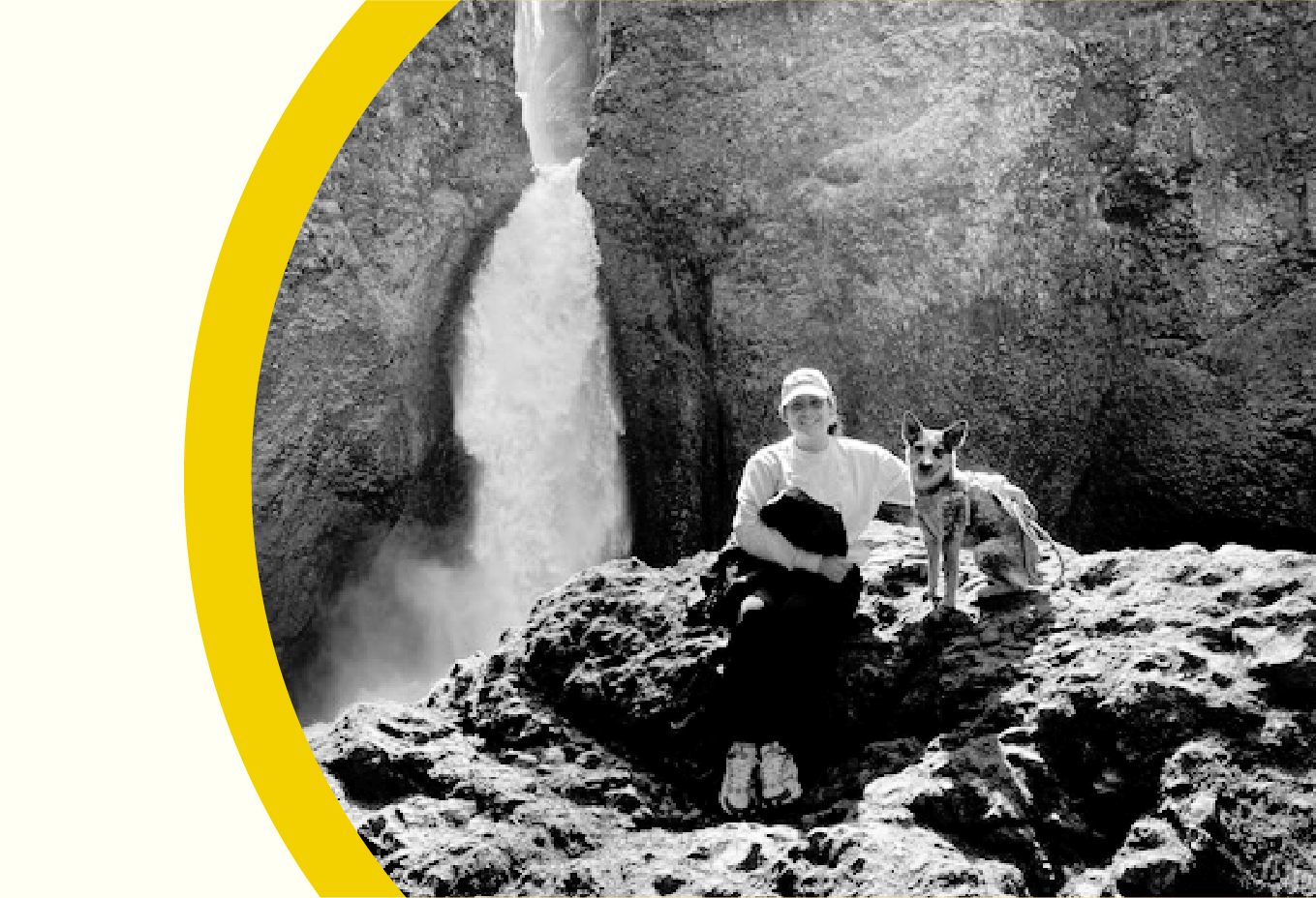 Migraine patient Erika Cortez hiking by a waterfall, with her dog.