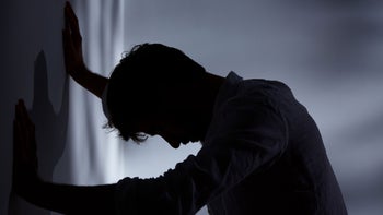 Health: Bipolar disorder: man upset leaning on wall 650326960