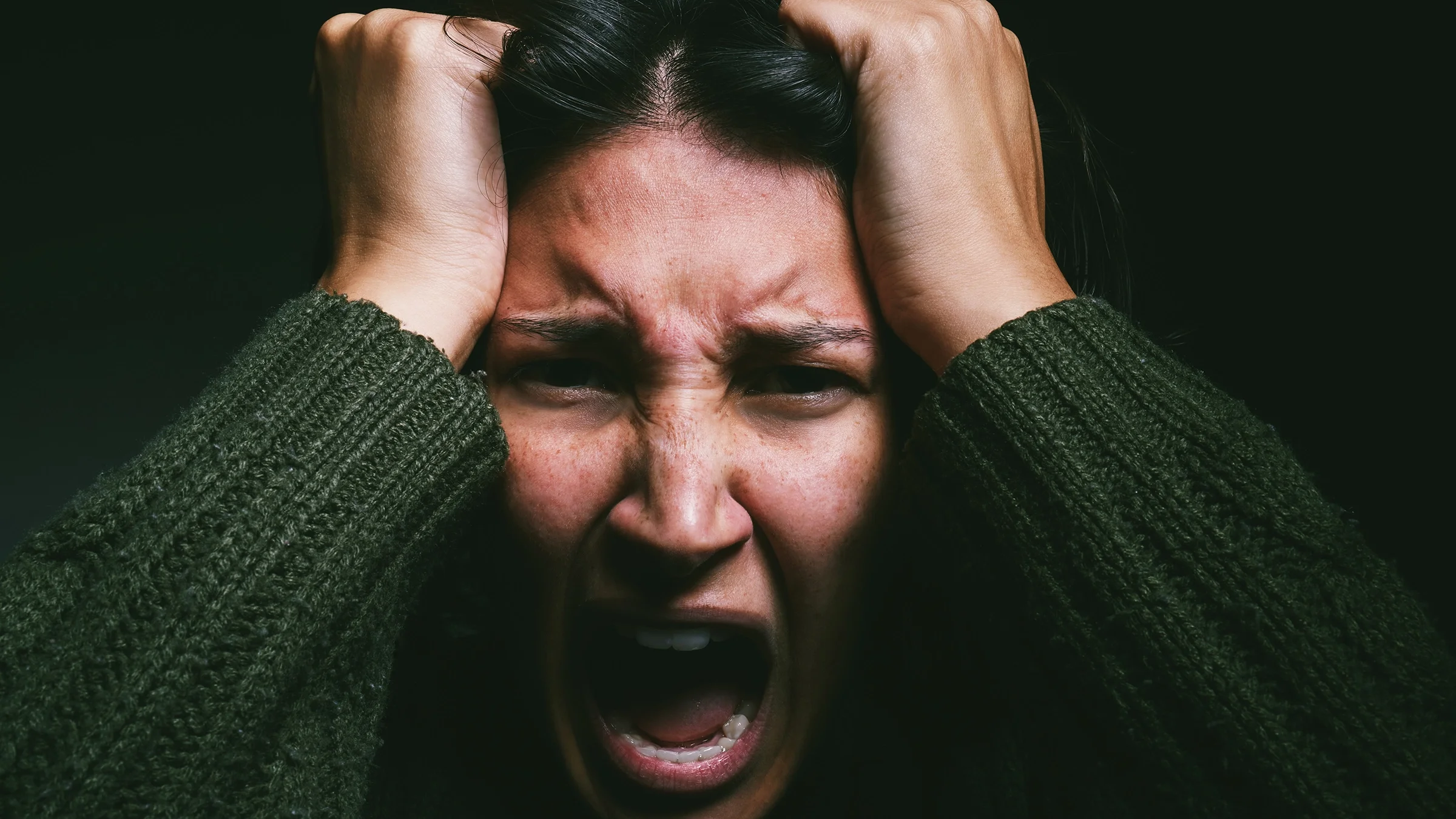 Woman experiencing mental anguish