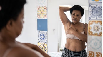 Breast cancer: Stage 0: self breast exam in colorful mirror 1350655441