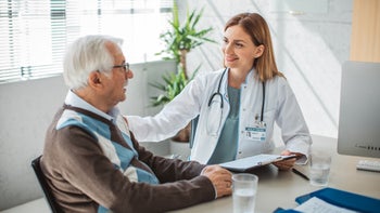 Health: Invokana: senior man speaking to doctor 1424397260