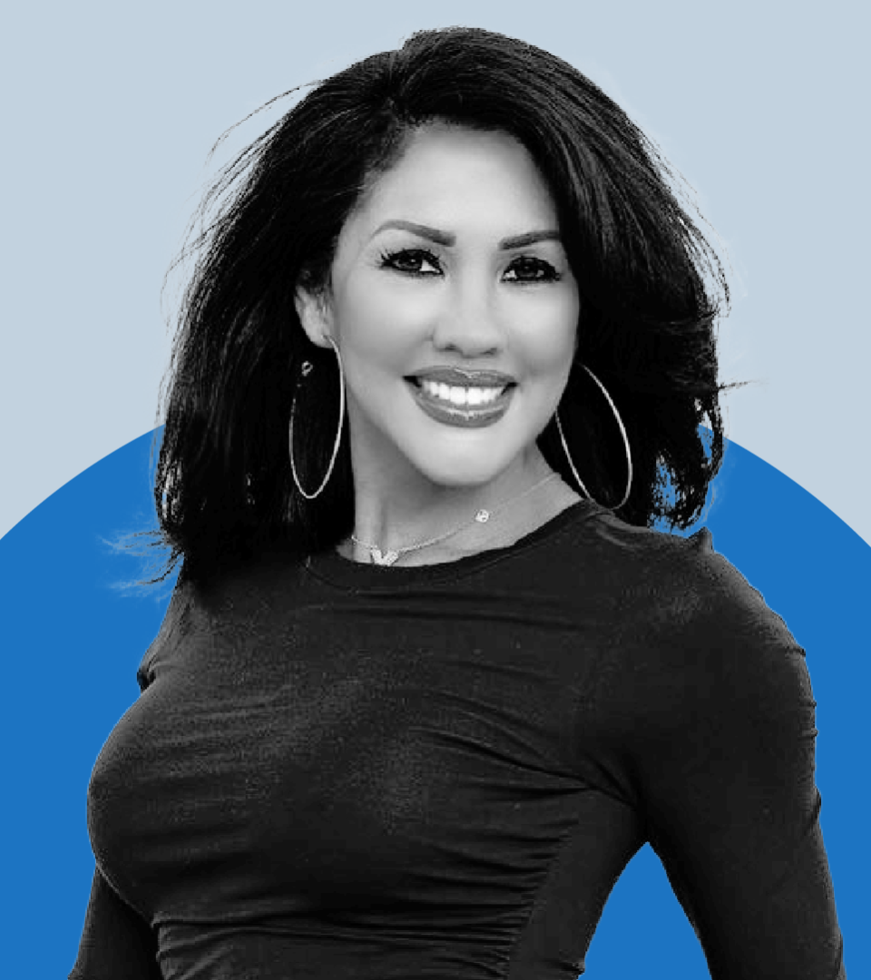 Mia St. John is pictured in a headshot.