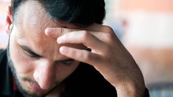 Health: Opioids: man feeling nausea 474093338