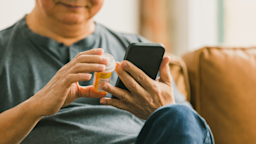 A man reads up on his prescription medication.
SDI Productions/iStock via Getty Images Plus