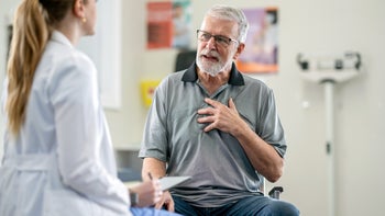 pulmonary-hypertension: senior man at medical appointment 2048636347