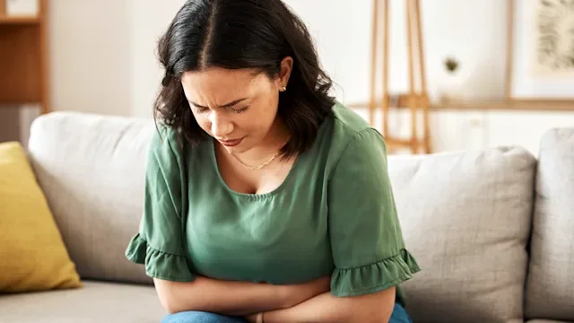 Gut Health: woman experiencing bloating 1618162857
