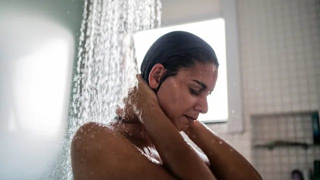 Mental-health: woman taking a shower 1385946698