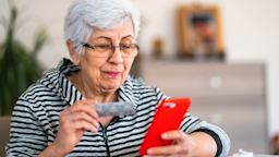  A woman discusses her medication with her provider during a telehealth call.
Ugur Karakoc/E+ via Getty Images