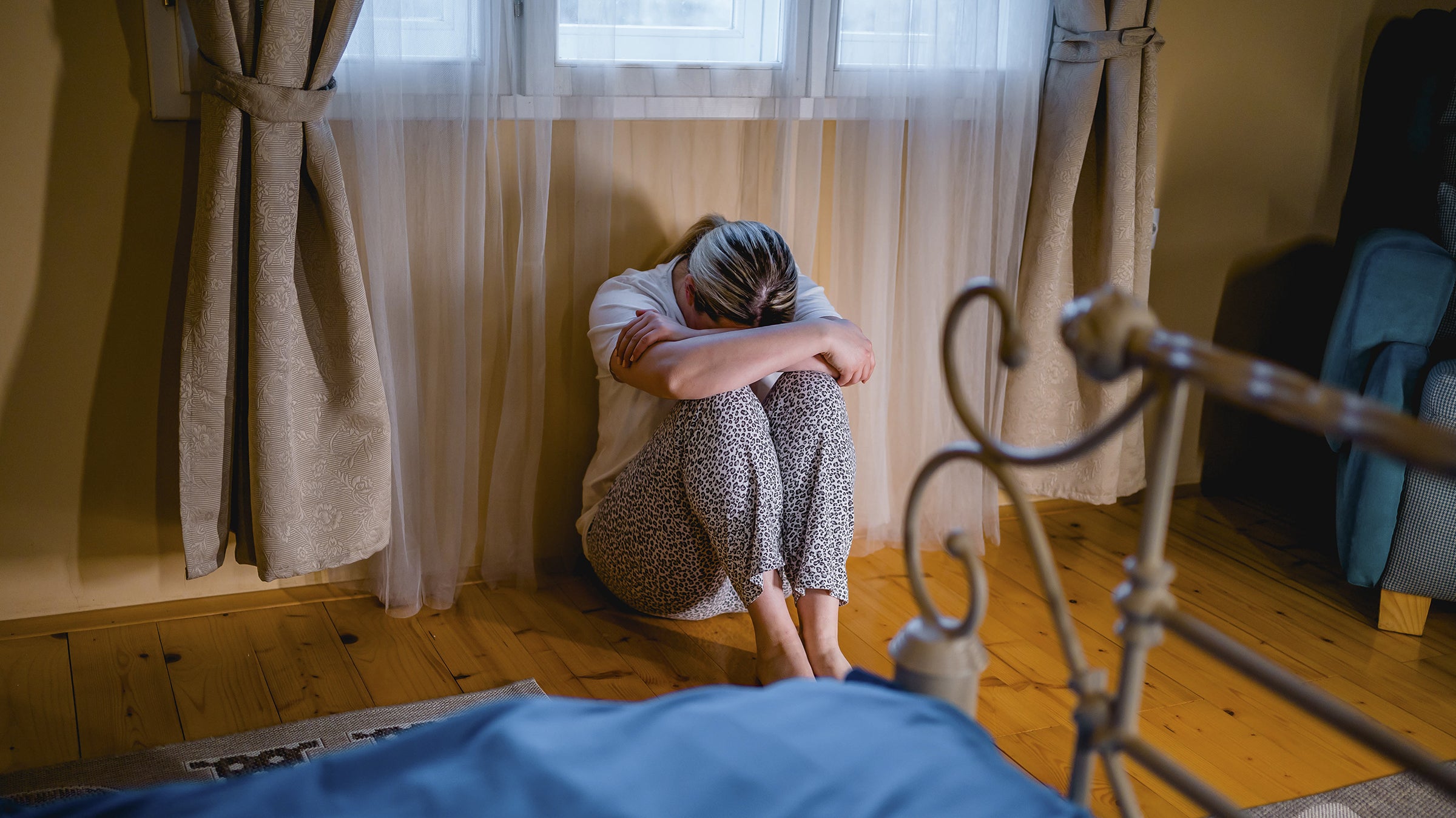 Generalized anxiety: depressive woman sitting alone 1310640159