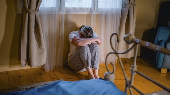 Generalized anxiety: depressive woman sitting alone 1310640159