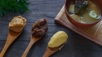 diet nutrition: spoonful of miso on table 596072274