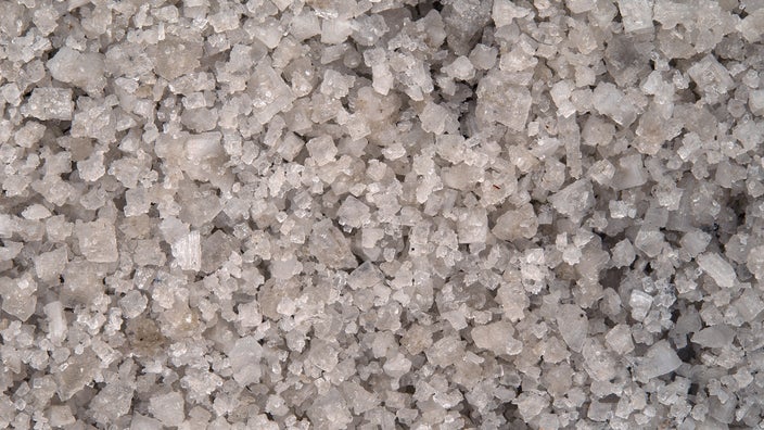 The image depicts a pile of gray Celtic salt.