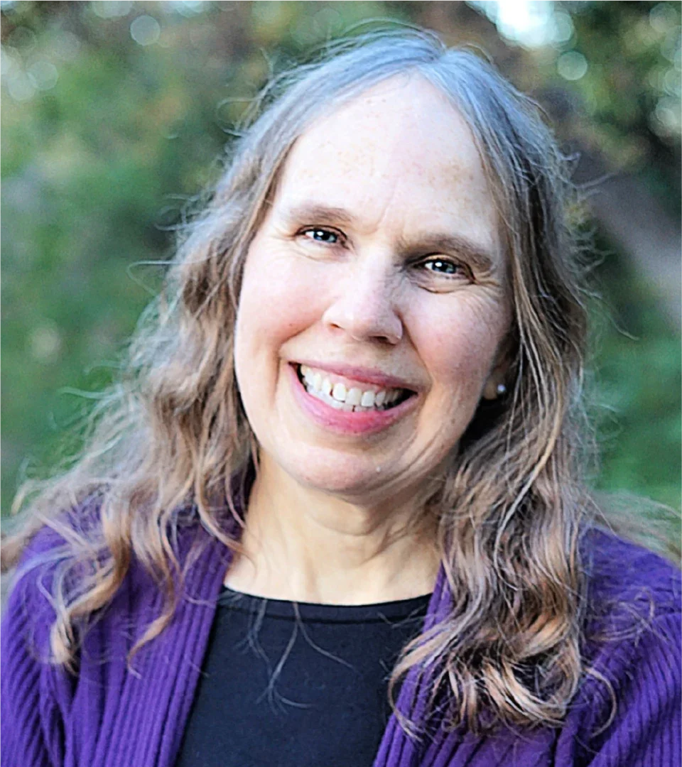 Maria Veres is pictured in a headshot.