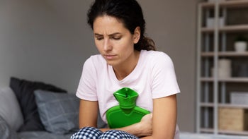 Health: Urinary tract infection: woman hot water bottle stomach 1369838504
