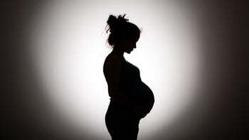 Pharmacists: Pregnant: side silhouette pregnant person-1128354894