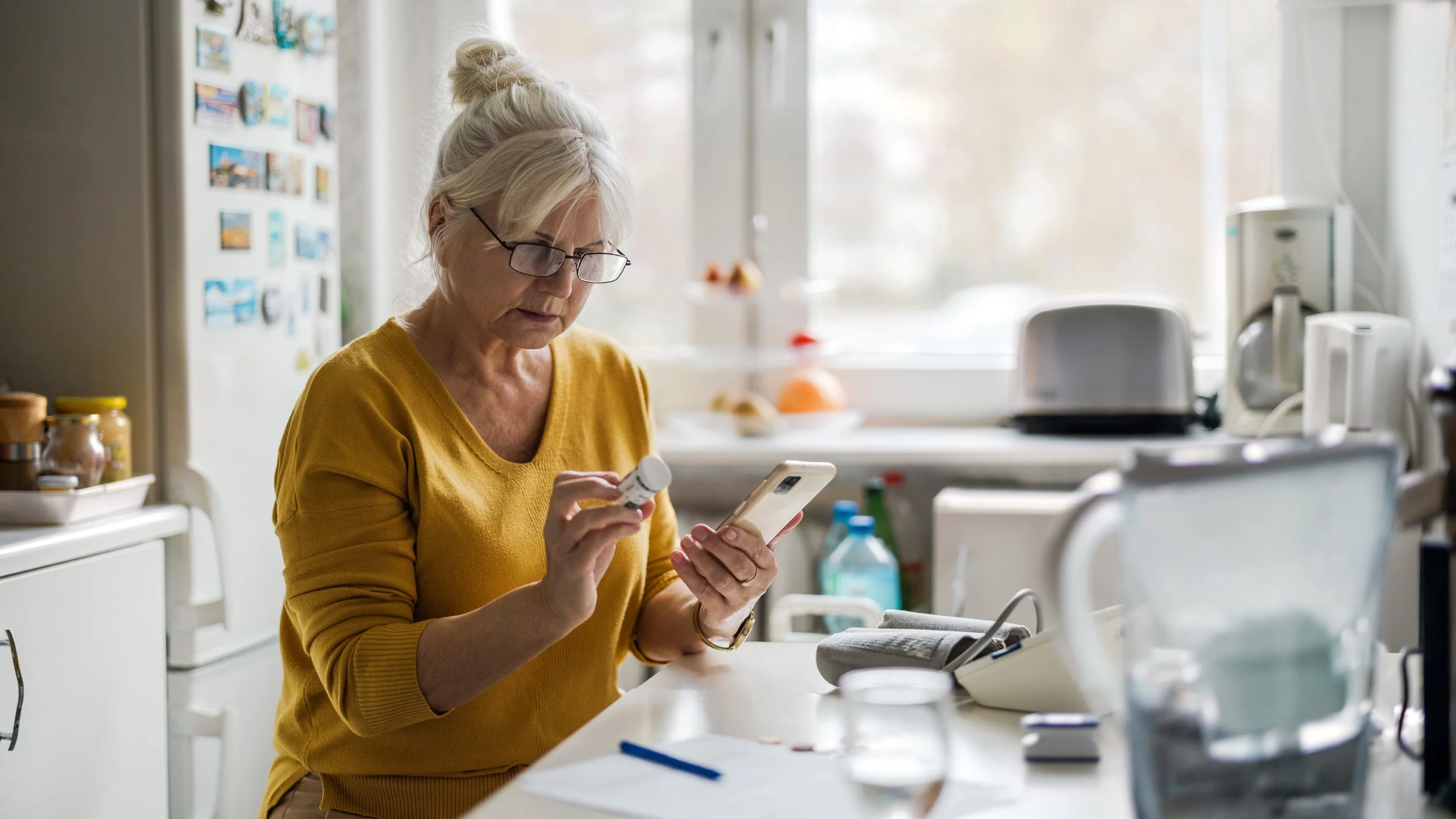 A woman reviews her prescription information.