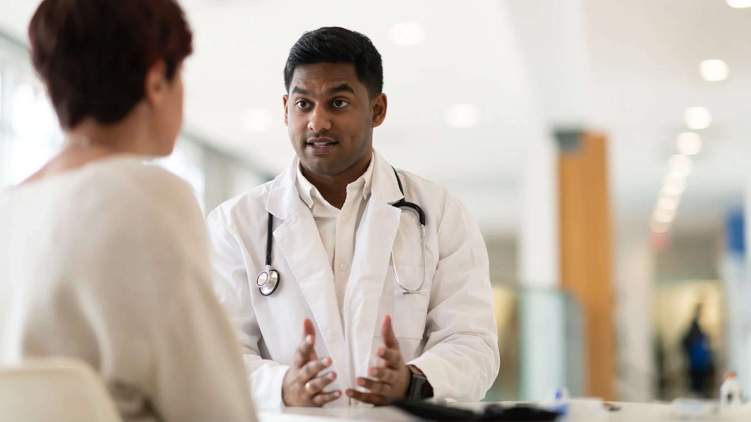 A healthcare professional speaks with a patient.
FatCamera/E+ via Getty Images