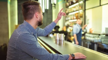 Ketorolac: raising hand at bar 1083103840