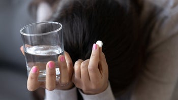 Sertraline: depressed holding pill water 1126400353