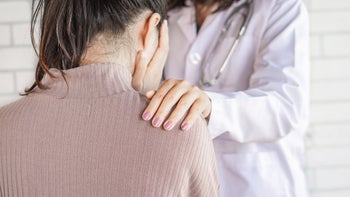 Opioid use disorder: Withdrawal: doctor comforting patient 1156900625