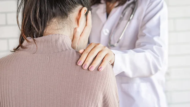 Opioid use disorder: Withdrawal: doctor comforting patient 1156900625