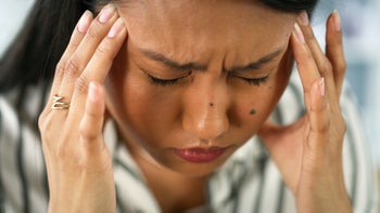 Migraine: Headache: adult with a migraine 2043430706