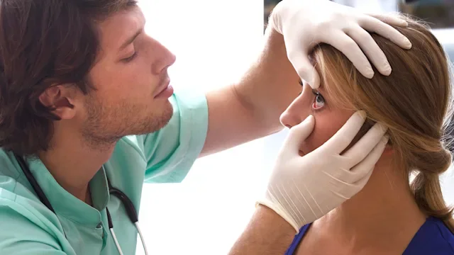 Health: Eye: examining eye 474296525