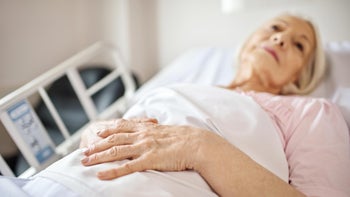 gastroenterology: woman hospital bed 884642004