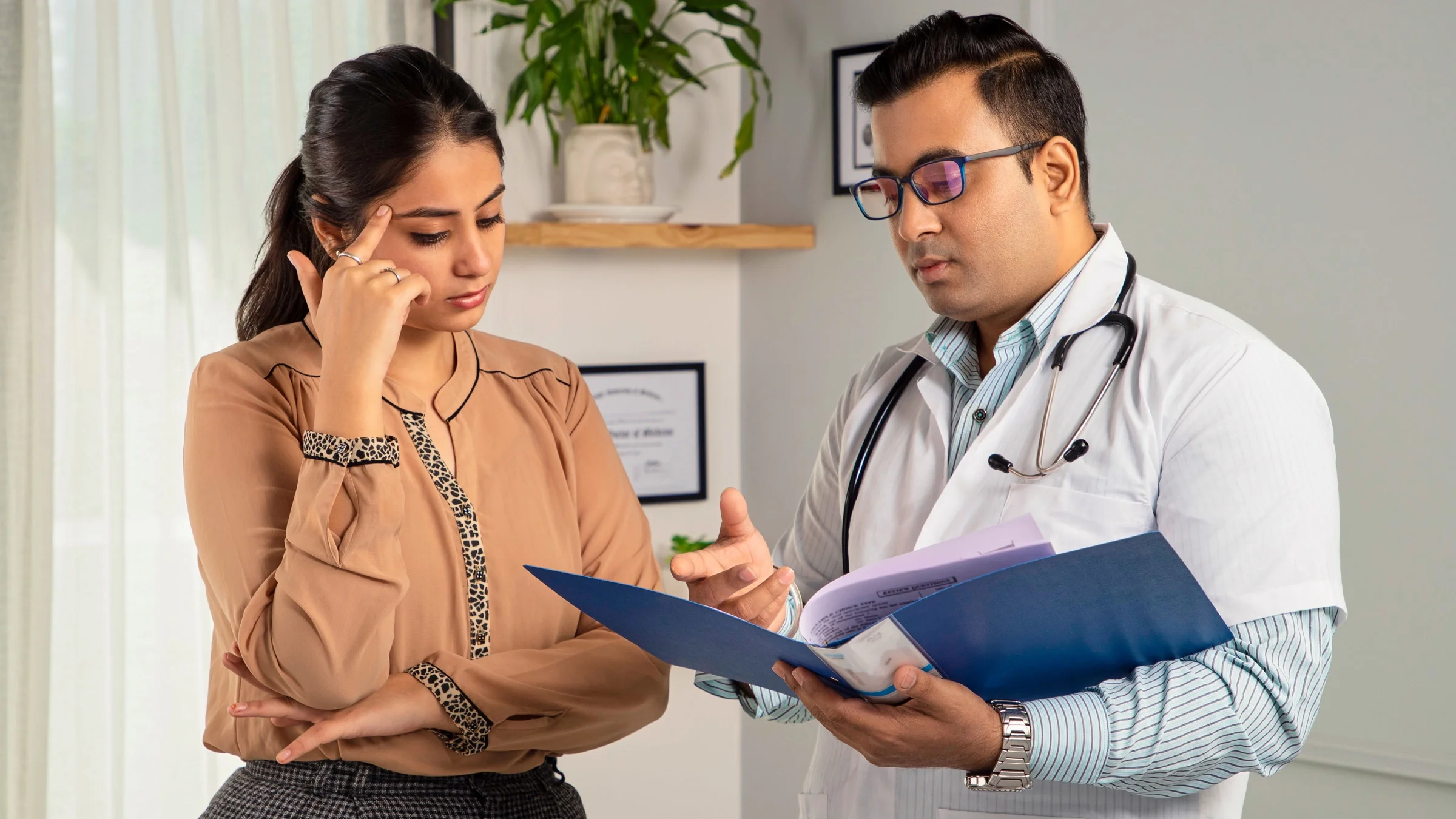 A doctor and patient talking.
