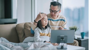 Tylenol: Time: father checking daughters temperature 1309783324