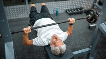 Movement-exercise: man doing bench press exercise 1363762649