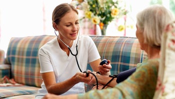 Health: Weight Loss: hcp taking blood pressure 489582925