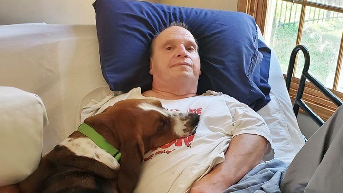 Jerry Schmitt is pictured with his dog, Hank.