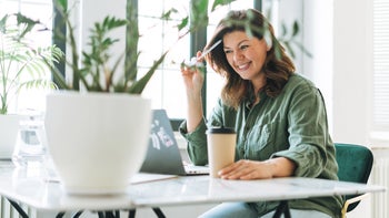 Insurance: EAPs: using laptop plant-filled office 1337995272