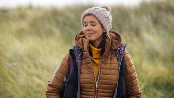 Cymbalta: woman takes deep breath outdoors 1837333067