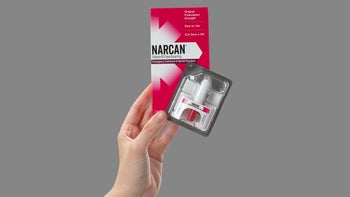 naloxone: hand holding narcan product CourtesyofEmergent 2400
