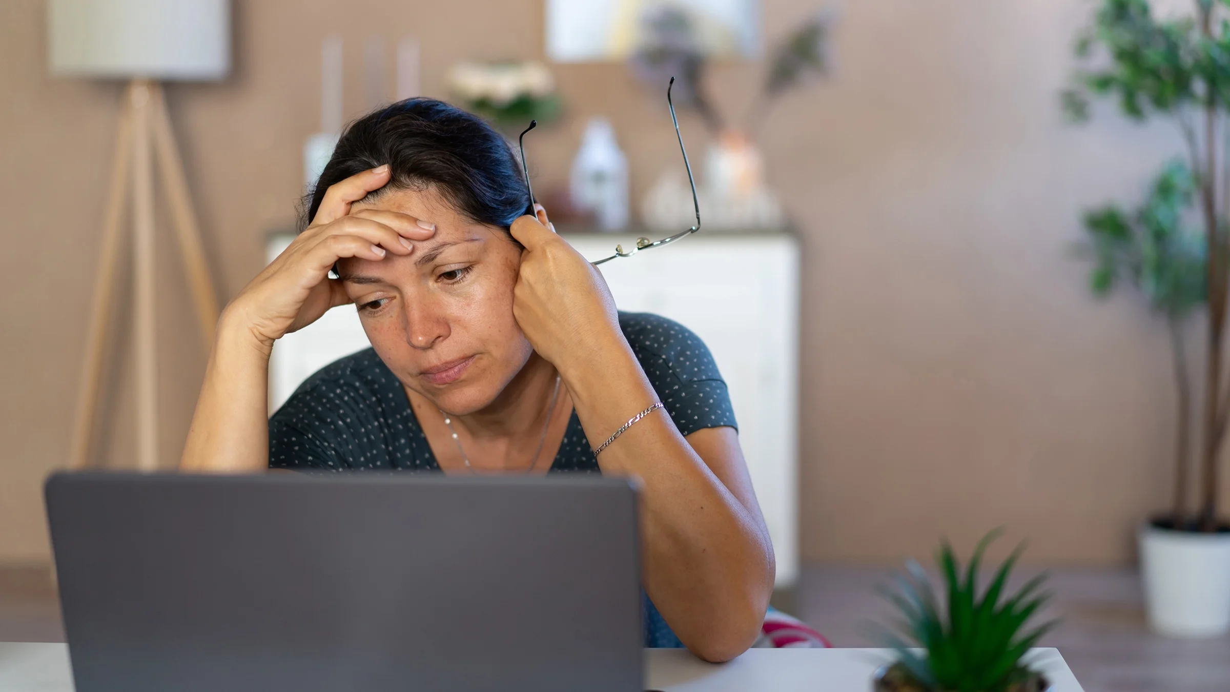 Woman doing research on laptop