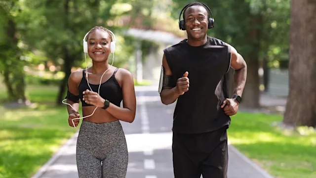 Health: Movement and exercise: young woman and man running 1267273192