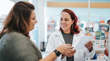 Pharmacy: pharmacist helping a customer 2160019311