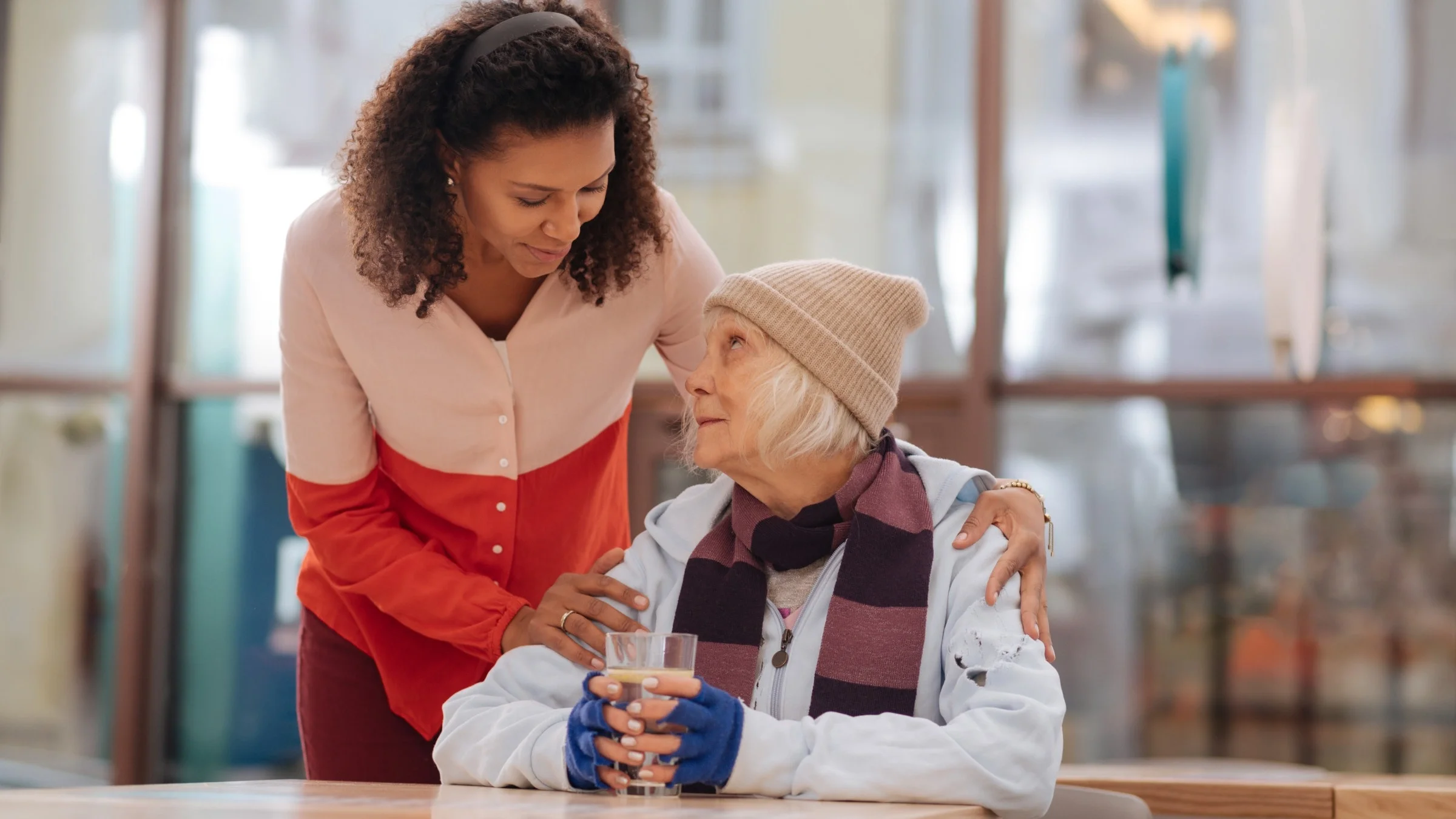A person checking in on someone who is drinking.